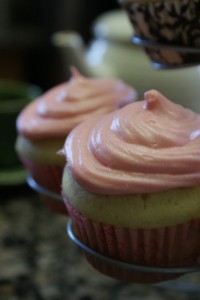 vanilla cupcakes with pink buttercream-cream cheese frosting